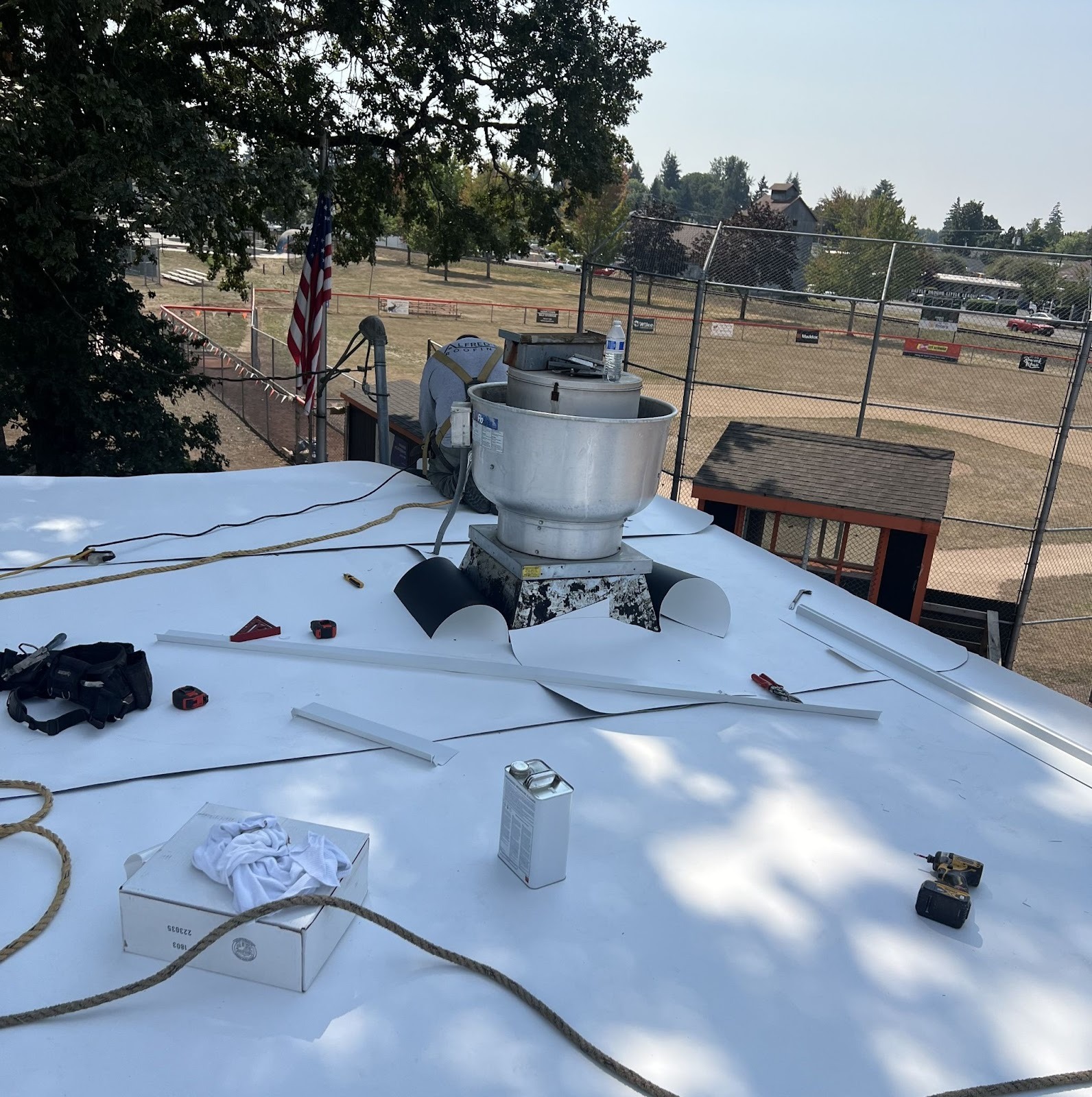 Commercial flat roof inspection showing membrane and rooftop equipment in Southwest Washington