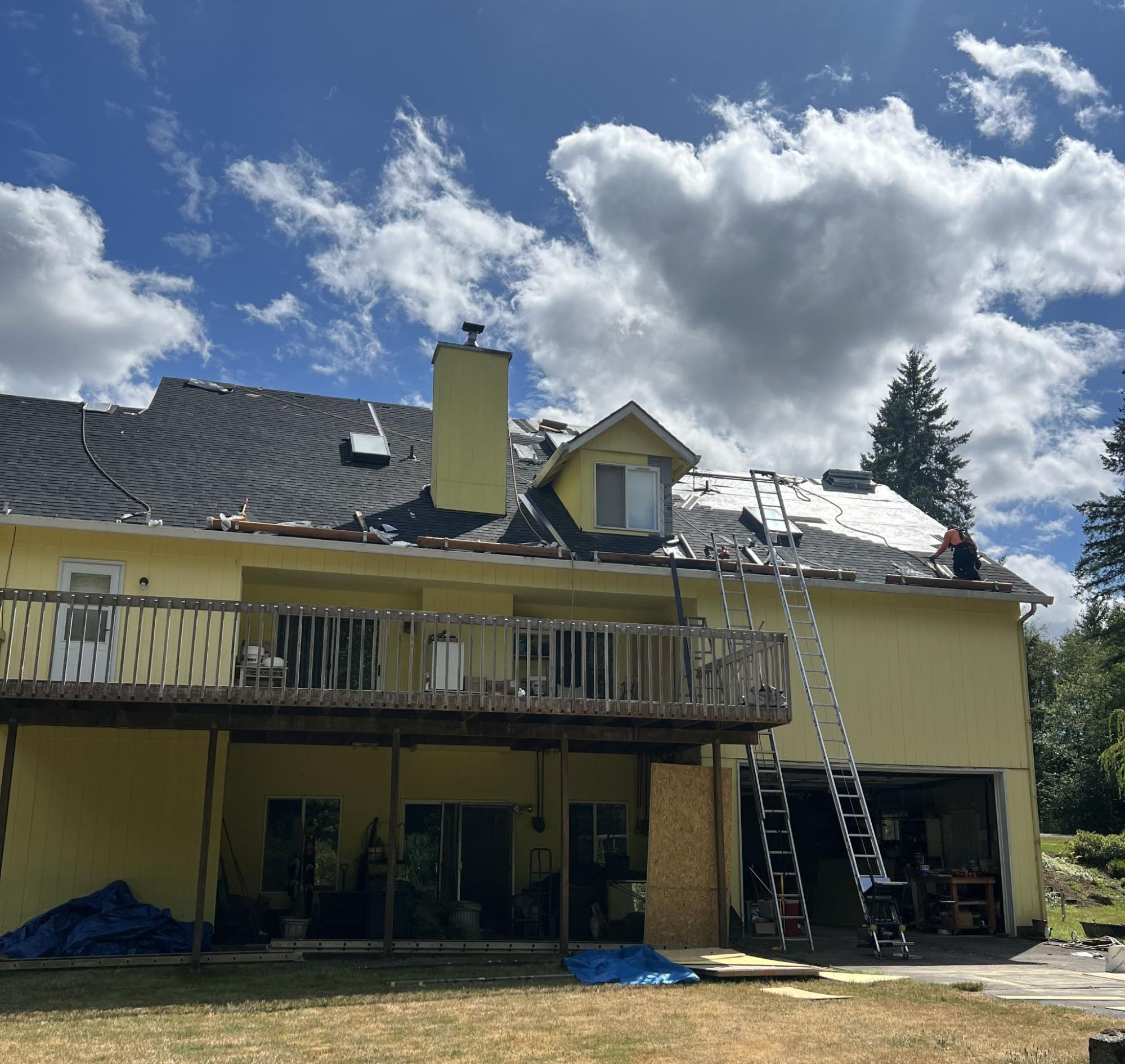 Alfred's Roofing crew completing the roof replacement process on a Southwest Washington home