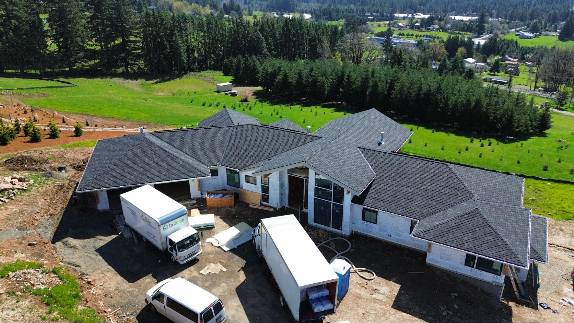 Aerial summer view of a Vancouver, WA home with a freshly installed asphalt shingle roof.
