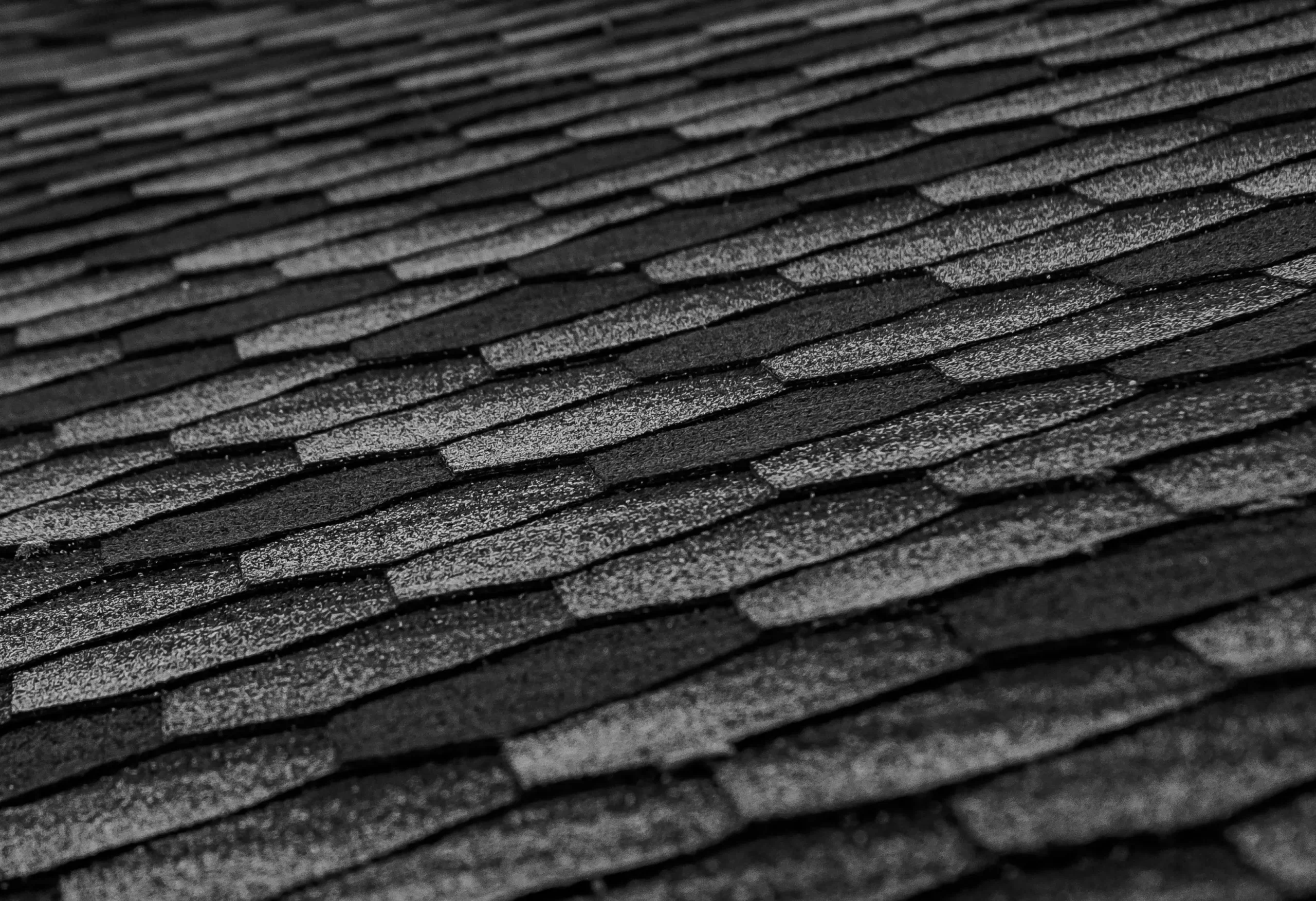 Close-up of dark dimensional architectural shingles on a Vancouver, WA roof.