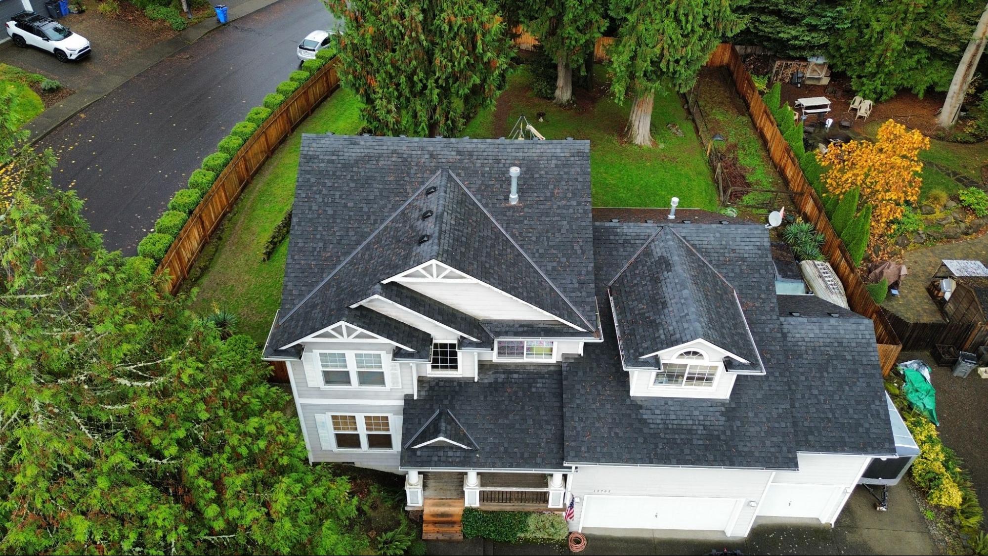 Aerial view of a new asphalt shingle roof installed by Alfred's Roofing near Battle Ground, WA.