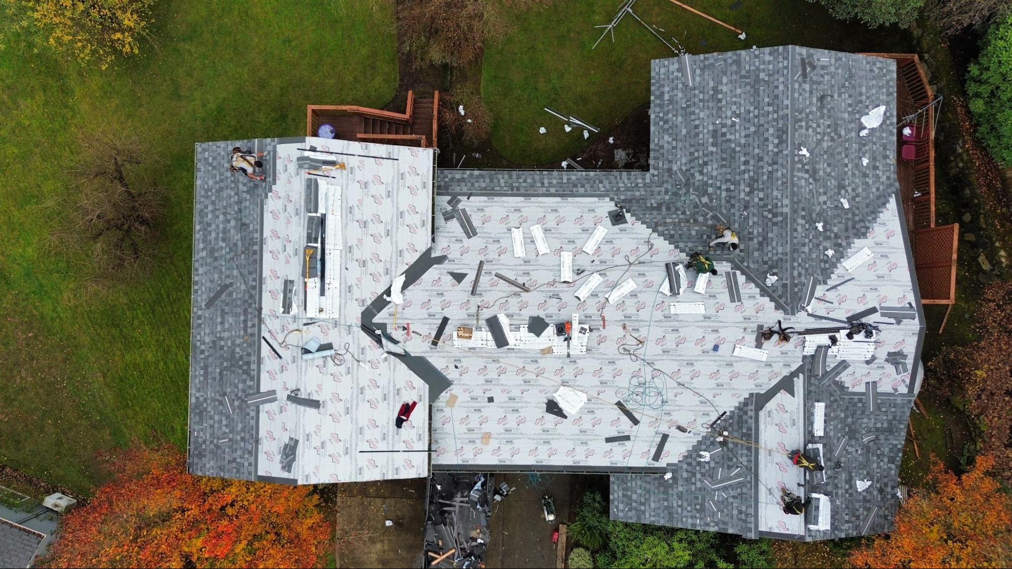 Aerial view of a roof replacement in progress on a Battle Ground, WA home.